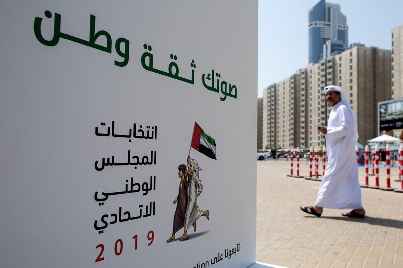 An Emirati voter in front of a polling station in Dubai. EPA