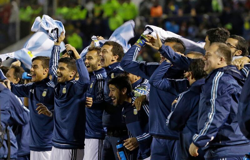 Argentina players celebrate after beating Ecuador to book their place at the 2018 World Cup. Fernando Vergara / AP Photo