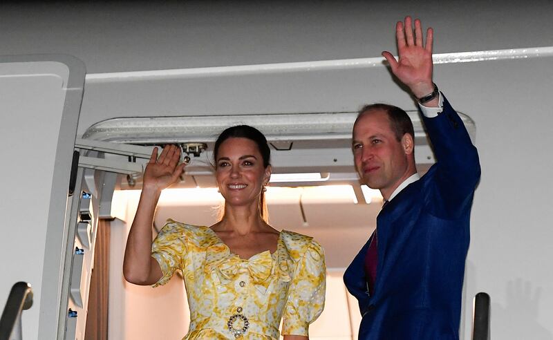 Prince William and Kate board a plane at Lynden Pindling International Airport as they leave the Bahamas at the end of their tour of the Caribbean.
