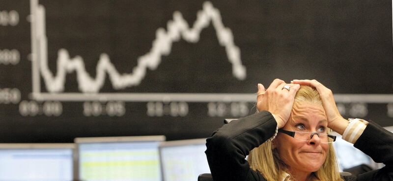 A broker reacts at the stock exchange in Frankfurt, central Germany, on Tuesday Sept. 16, 2008. European stock markets fell again on Tuesday caused by the U.S. financial crisis. (AP Photo/Daniel Roland)
