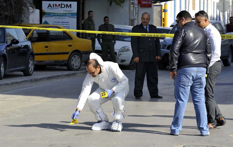 epa06301461 Tunisian forensic police check the scene of a knife attack on two traffic policemen near the parliament building in Tunis, Tunisia, 01 November 2017. According to reports, two policemen were injured after a man stabbed them with a knife near the parliament building in Tunis. The suspected assailant was arrested.  EPA/STR
