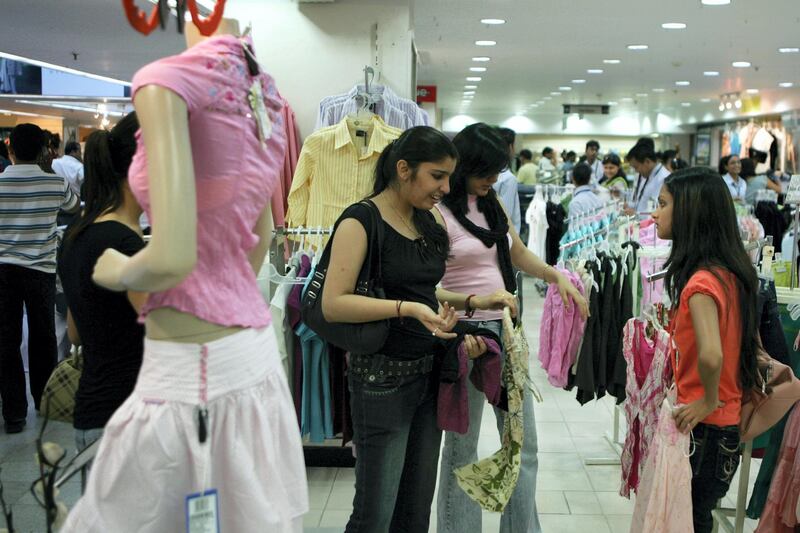 TO GO WITH INDIA ECONOMY CONSUMER

Indian women shop for clothes in Shoppers Stop department store in New Delhi, 05 May 2007.India's consumer spending is set to quadruple by 2025, overtaking Germany, as a youthful population earns more and saves less and millions climb out of poverty, according to a new study.India's consumer market will expand at an average annual rate of 7.3 percent annually to reach more than 1.5 trillion dollars, according to the report conducted by the McKinsey Global Institute and released this month.   AFP PHOTO/ Manpreet ROMANA (Photo by MANPREET ROMANA / AFP)