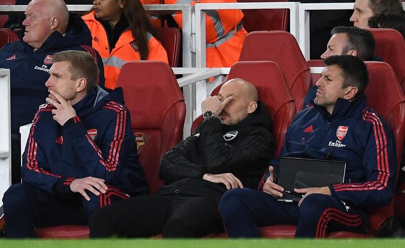 epa08047732 Arsenal caretaker manager Freddie Ljungberg (C) and assistant coaches Per Mertesacker (L) and Sal Bibbo (R) watches his team loose 2-1 to Brighton during an English Premier League soccer match in London, Britain, 05 December 2019.  EPA/ANDY RAIN EDITORIAL USE ONLY. No use with unauthorized audio, video, data, fixture lists, club/league logos or 'live' services. Online in-match use limited to 120 images, no video emulation. No use in betting, games or single club/league/player publications