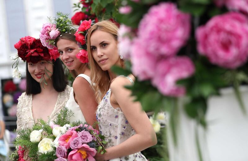 Models at the Primrose Hall peony display.