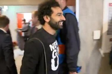 Mohamed Salah goes to greet his Liverpool teammates after their 4-0 victory over Barcelona. Courtesy LFCTV