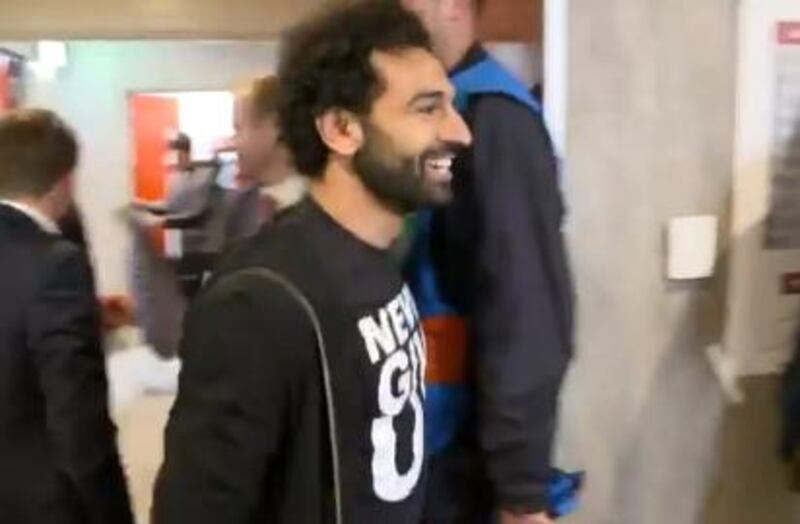 Mohamed Salah goes to greet his Liverpool teammates after their 4-0 victory over Barcelona. Courtesy LFCTV