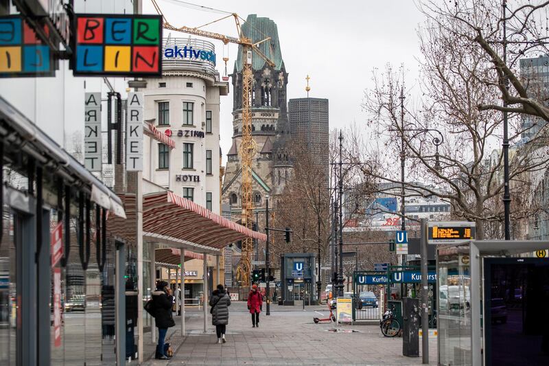 People walk along an almost empty street in Berlin, Germany. The lockdown state governments launched in December has been continued into February. Getty Images