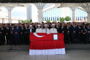 The coffin of Turkish diplomat Osman Kose during his funeral ceremony in Ankara, Turkey, 18 July 2019. EPA