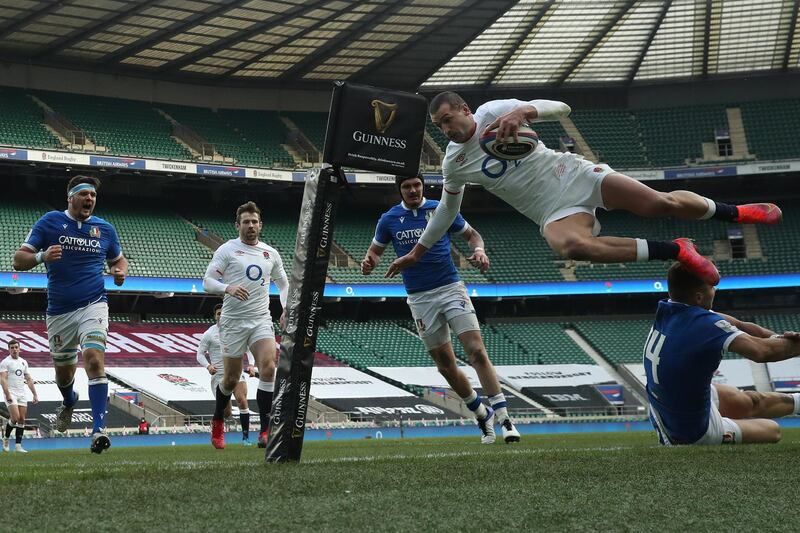 England's Jonny May dives over to score his side's third try in their 41-18 Six Nations victory over Italy at Twickenham on Saturday, February 13. Getty