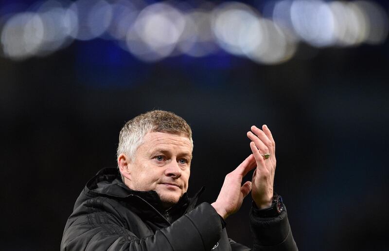 Manchester United manager Ole Gunnar Solskjaer applauds the fans following the League Cup semi-final second leg against Manchester City at the Etihad Stadium. AFP