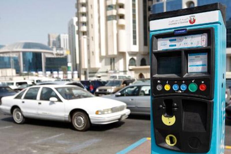 Abu Dhabi - October 5, 2009: Mawaqif parking meters near Hamdan and sixth street. ( Philip Cheung / The National )


