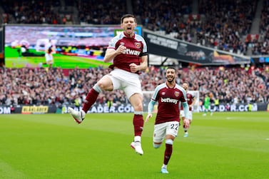 Soccer Football - Premier League - West Ham United v Everton - London Stadium, London, Britain - April 3, 2022 West Ham United's Aaron Cresswell celebrates scoring their first goal with Said Benrahma Action Images via Reuters/Peter Cziborra EDITORIAL USE ONLY.  No use with unauthorized audio, video, data, fixture lists, club/league logos or 'live' services.  Online in-match use limited to 75 images, no video emulation.  No use in betting, games or single club /league/player publications.   Please contact your account representative for further details.      TPX IMAGES OF THE DAY