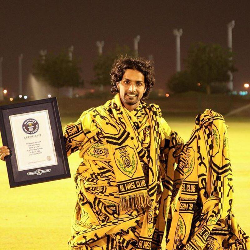 Salem Alkarbi holds the Guinness World Record for the world’s longest fan scarf. Courtesy Salem Alkarbi