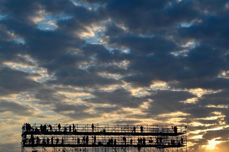 The media spot is silhouetted against the early morning sky before Pope Francis arrives to officiate an open-air mass officiated at the Campo San Juan Pablo II on the outskirts of Panama City. AFP