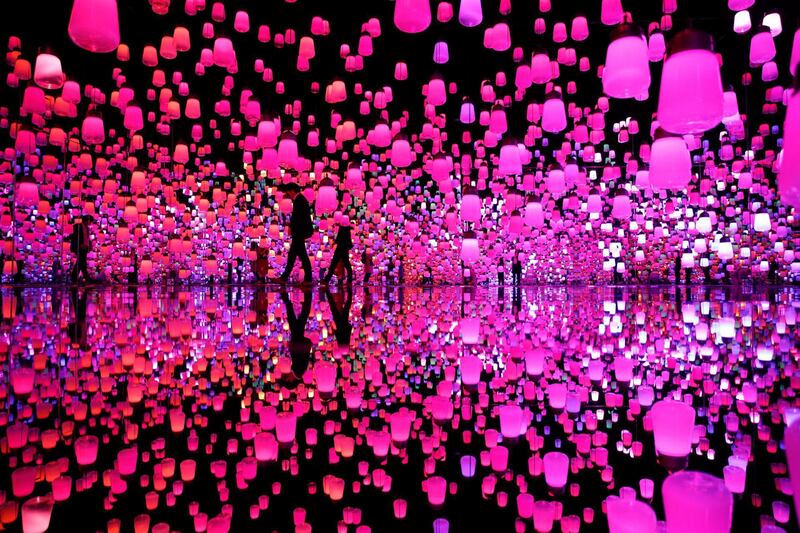 Visitors stroll through a digital artwork on display at the digital art museum 'teamLab Borderless' by Japanese creative group teamLab in Tokyo, Japan.  All photos by Franck Robichon / EPA