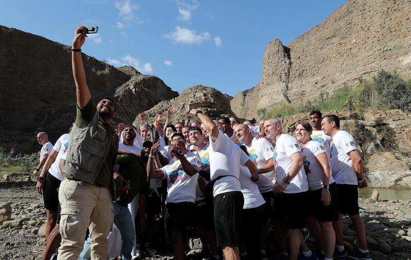 FUJAIRAH , UNITED ARAB EMIRATES , March 4 – 2019 :- Volunteers , officials and staff members of Wadi Al Wurayah taking selfie with the Special Olympics torch “Flame of Hope” in Wadi Al Wurayah Waterfalls in Fujairah. ( Pawan Singh / The National )
For News/Online/Instagram/Big Picture. Story by Ruba
