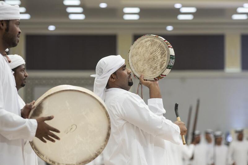 Men sing during a group wedding for Dr Sheikh Khaled bin Sultan bin Zayed (not shown), and other grooms at Mushrif Palace. Ryan Carter / Crown Prince Court - Abu Dhabi