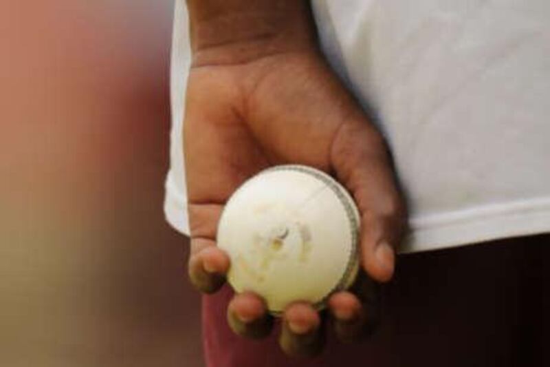 A West Indies cricketer holds a ball during a practice session on July 2, 2008 at Warner Park in Basseterre, Saint Kitts in advance of the One-Day International match against Australia on July 4. Australia leads 3-0 in the five game series. AFP PHOTO/Stan HONDA *** Local Caption ***  817241-01-08.jpg