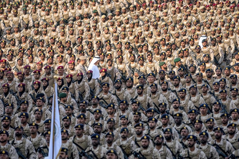 SWEIHAN, ABU DHABI, UNITED ARAB EMIRATES - February 09, 2020: HH Sheikh Mohamed bin Zayed Al Nahyan, Crown Prince of Abu Dhabi and Deputy Supreme Commander of the UAE Armed Forces (C), inspects military personnel during a reception to celebrate and honor members of the UAE Armed Forces who participated in the Arab coalition in Yemen, at Zayed Military City.

( Mohamed Al Hammadi / Ministry of Presidential Affairs )
---