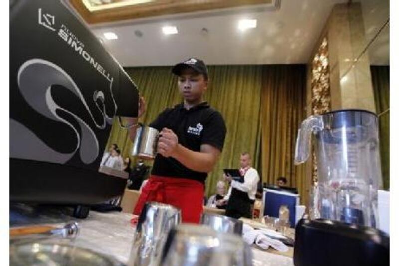 Darwin Malit competes in the UAE Barista Championship at the Middle East Coffee and Tea Convention 2010 in Dubai.