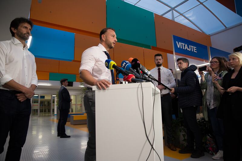 Minister of Interior Matus Sutaj Estok speaks to media with Minister of Defence Robert Kalinak, left, at the FD Roosevelt Teaching Hospital in Banska Bystrica, where Mr Fico is being treated. Getty Images