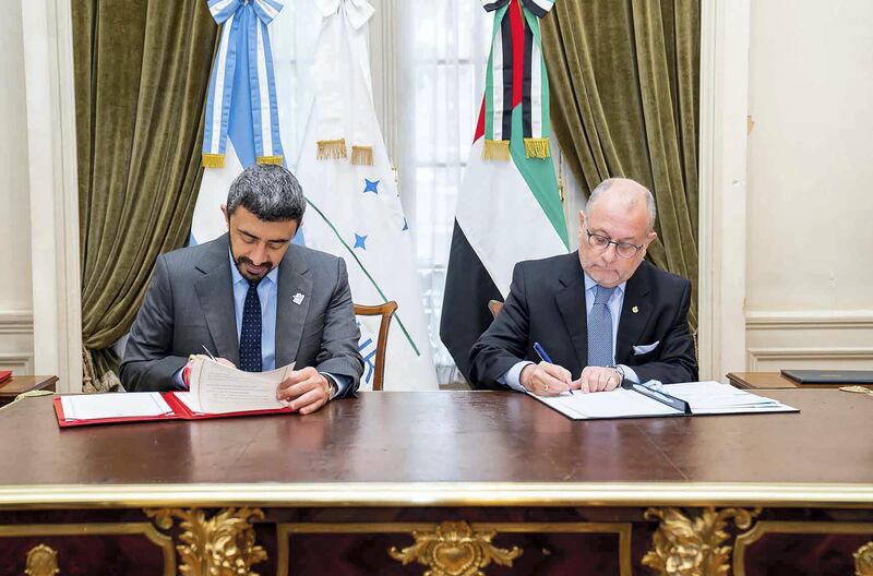 Jorge Marcelo Faurie, Minister of Foreign Affairs and Worship of Argentina, and Sheikh Abdullah bin Zayed, Minister of Foreign Affairs and International Cooperation of UAE, signing documents. Wam