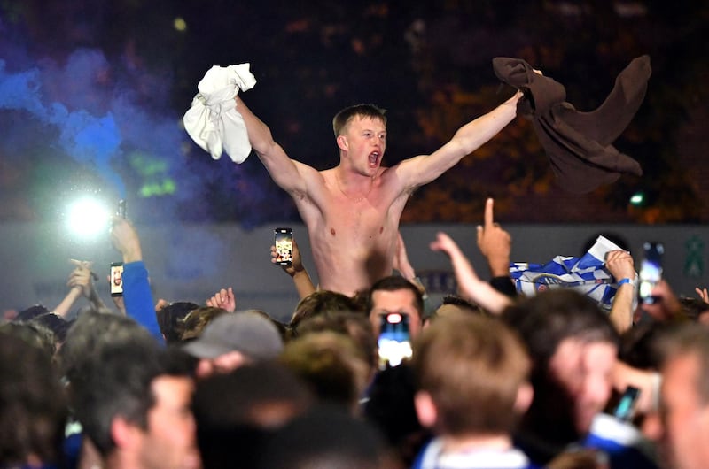 Chelsea supporters celebrate in streets surrounding their Stamford Bridge stadium in London their Champions League victory. PA