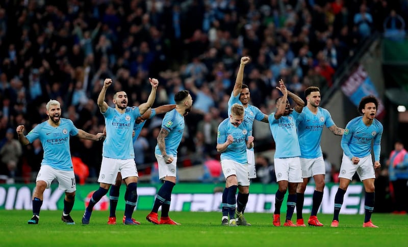 Manchester City players react during the penalty shootout. Action Images via Reuters