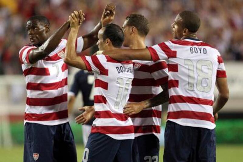 Players of the U.S. celebrates after scoring against Scotland during their international friendly soccer match in Jacksonville, Florida May 26, 2012. REUTERS/Daron Dean (UNITED STATES - Tags: SPORT SOCCER)