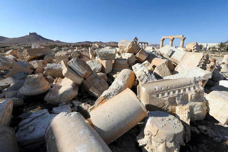 A view of the remains of Baalshmin temple, which was destroyed by jihadists of the Islamic State (IS) group in 2015, in the Syrian ancient city of Palmyra on March 31, 2016. - Syrian troops backed by Russian forces recaptured Palmyra on March 27, 2016, after a fierce offensive to rescue the city from jihadists who view the UNESCO-listed site's magnificent ruins as idolatrous. (Photo by JOSEPH EID / AFP)