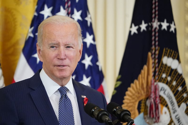 US President Joe Biden speaks during a World Aids Day commemoration event in the East Room of the White House. AFP