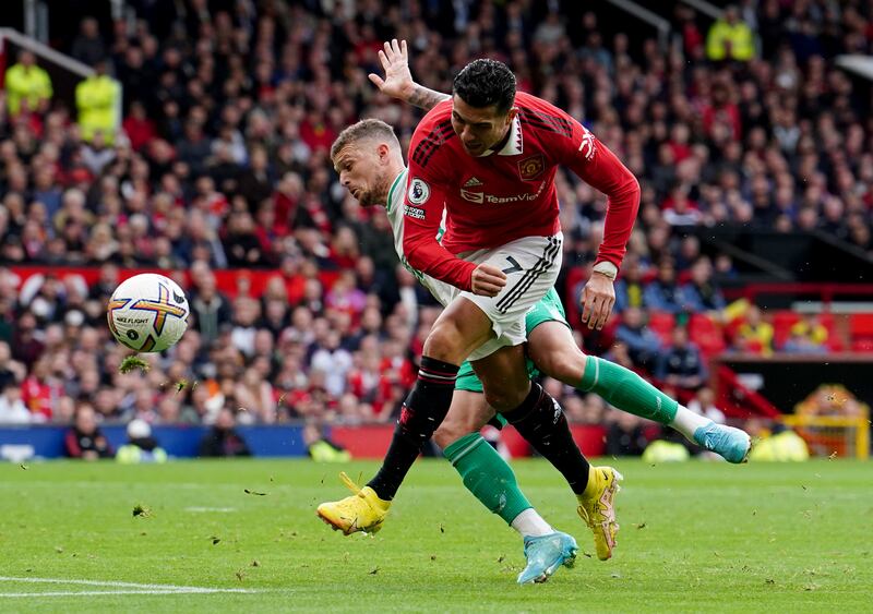 Manchester United's Cristiano Ronaldo shoots at goal under pressure from Kieran Trippier of Newcastle. PA