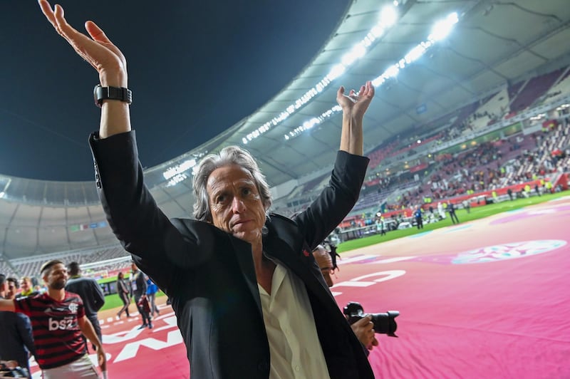 Flamengo coach Jorge Jesus greets the crowd following his team's victory against Saudi's Al Hilal in the Club World Cup semi-final. AFP