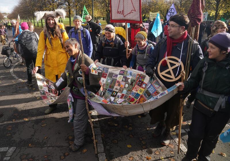 Environmental protesters in Glasgow before Cop26. The coming days will determine whether the Scottish city will host a climate change breakthrough. PA