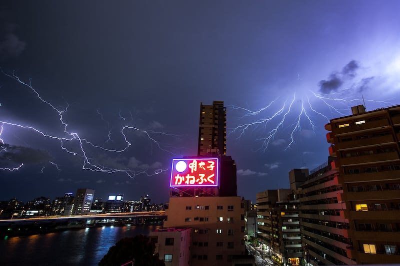 This long exposure photo shows lightning over the Koto district of Tokyo. AFP