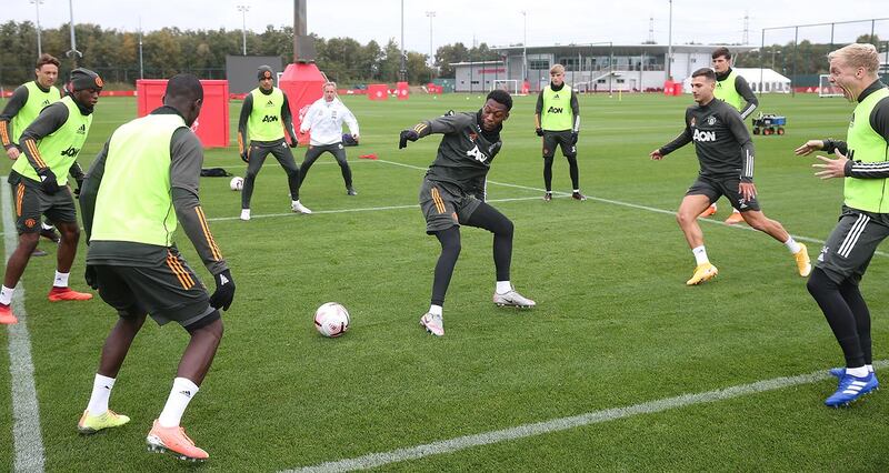 MANCHESTER, ENGLAND - OCTOBER 02: (EXCLUSIVE COVERAGE)  Aaron Wan-Bissaka, Nemanja Matic, Eric Bailly, Mason Greenwood, Timothy Fosu-Mensah, Brandon Williams, Diogo Dalot, Harry Maguire, Donny van de Beek of Manchester United in action during a first team training session at Aon Training Complex on October 02, 2020 in Manchester, England. (Photo by Matthew Peters/Manchester United via Getty Images)