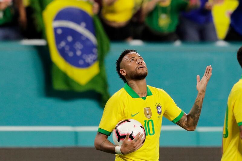 Neymar reacts after scoring against Colombia. AP Photo