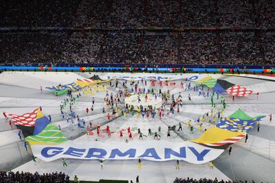 Dancers perform during the opening ceremony ahead of the the match between Germany and Scotland. EPA
