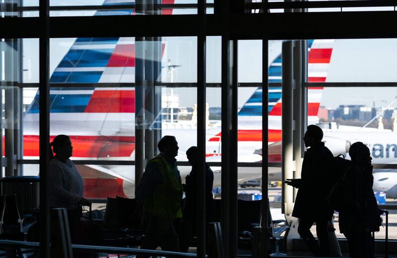 Planes at Ronald Reagan Washington National Airport in Arlington, Virginia. Business travellers say they are more frequently blending business and personal travel than they did in 2019. AFP