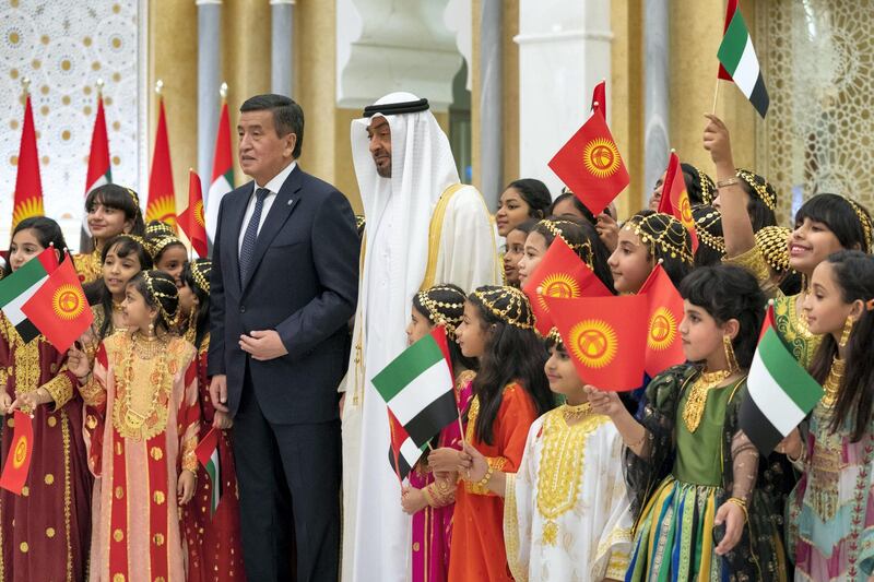 ABU DHABI, UNITED ARAB EMIRATES -December 12, 2019: HH Sheikh Mohamed bin Zayed Al Nahyan, Crown Prince of Abu Dhabi and Deputy Supreme Commander of the UAE Armed Forces (Centre R) and HE Sooronbay Sharipovich Jeenbekov, President of Kyrgyzstan (Centre L) stand for a photograph with school children, during an official visit reception, at Qasr Al Watan. 

(  / Ministry of Presidential Affairs )​
---

( Hamad Al Mansoori for the Ministry of Presidential Affairs )

---