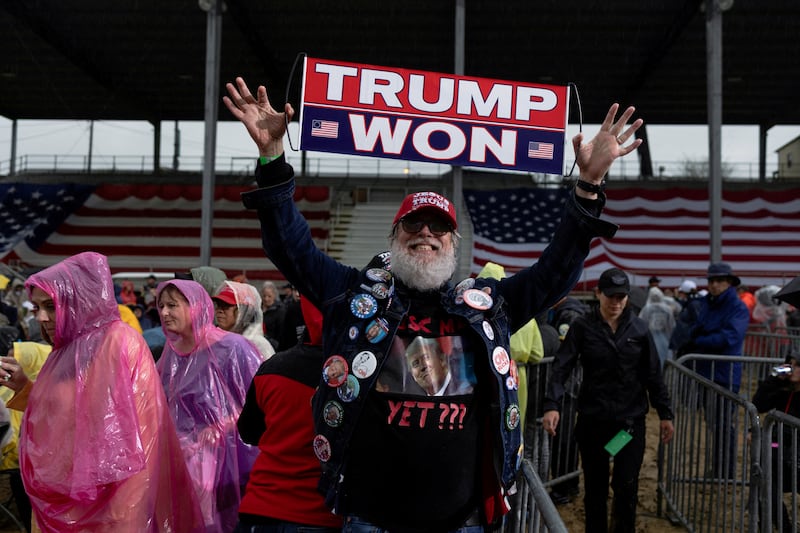 A man poses for a photo before a Trump rally in Pennsylvania. Reuters