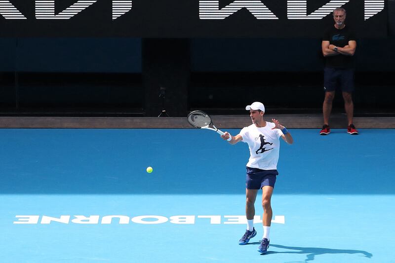 Novak Djokovic returns a shot at Melbourne Park. AFP