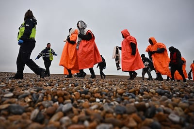 People picked up at sea by lifeboat crews while attempting to cross the English Channel. AFP
