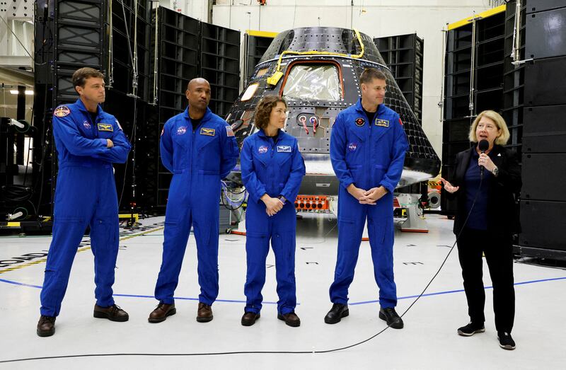 Nasa selected four astronauts to fly around the Moon as part of its Artemis 2 mission, scheduled for 2025. Reuters