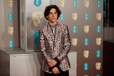 (FILES) In this file photo taken on February 10, 2019 French-US actor Timothee Chalamet poses on the red carpet upon arrival at the BAFTA British Academy Film Awards at the Royal Albert Hall in London. New York's star-studded Met Gala will focus on youth and diversity this year, with four co-chairs under the age of 30 -- actor Timothee Chalamet, poet Amanda Gorman, singer Billie Eilish and tennis player Naomi Osaka. / AFP / Tolga AKMEN
