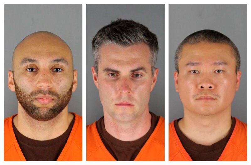 This combination of photos provided by the Hennepin County Sheriff's Office in Minnesota shows J. Alexander Kueng, from left, Thomas Lane and Tou Thao. They have been charged with aiding and abetting Derek Chauvin, who is charged with second-degree murder of George Floyd, a black man who died after being restrained by the Minneapolis police officers on May 25. AP