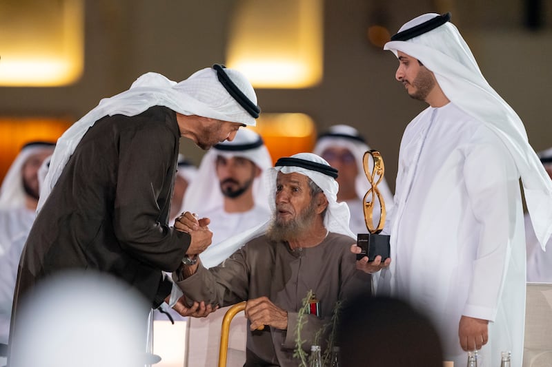 President Sheikh Mohamed with Abu Dhabi Award Winner Saeed Naseeb Al Mansoori, a campaigner for education in the Al Wathba region for more than 30 years, a role model for his generosity, charitable endeavours and an exemplary citizen of Abu Dhabi. Abdulla Al Bedwawi / UAE Presidential Court 