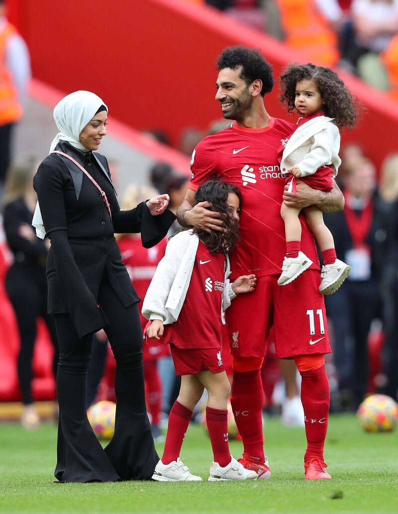 Mohamed Salah of Liverpool on the pitch with his family. Getty