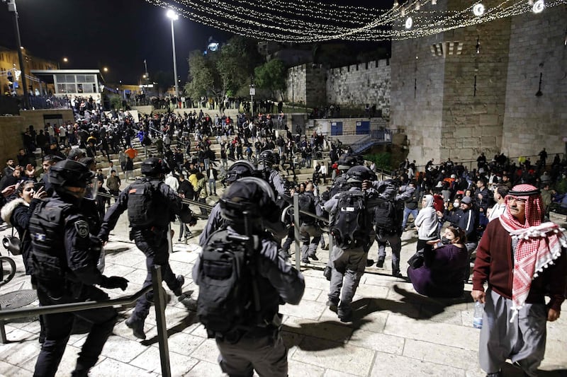 Israeli security forces disperse Palestinian protesters outside the Damascus Gate in Jerusalem's Old City. AFP