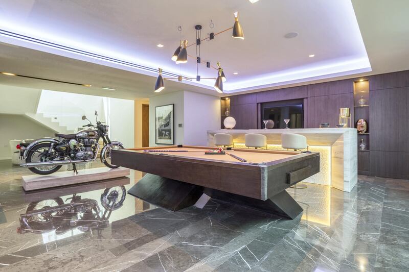The games room is located in the basement. Courtesy LuxuryProperty.com